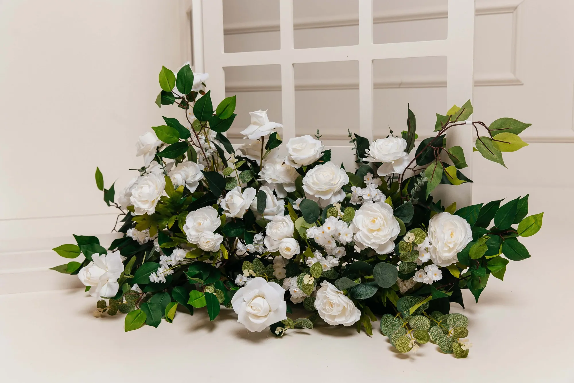 White rose floral styling for the telephone booth audio guestbook