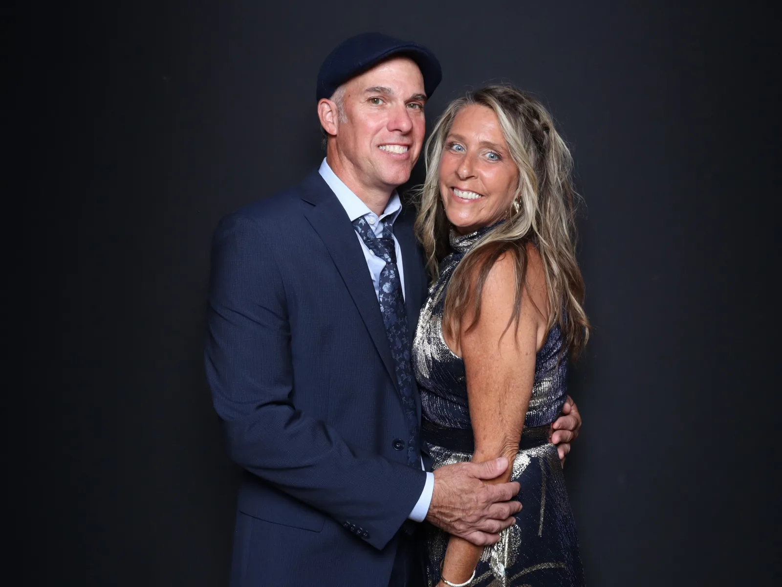 Wedding guests posing in the Luxe enclosed photo booth in Chicago