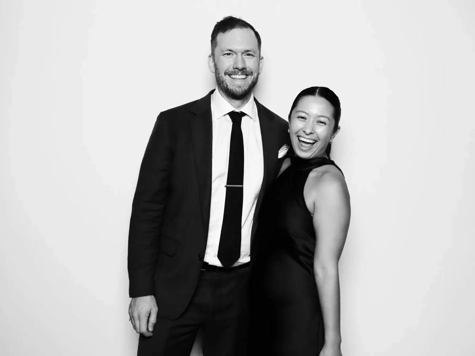 Black and white glam photo booth portrait of a couple in black tie at a Chicago wedding