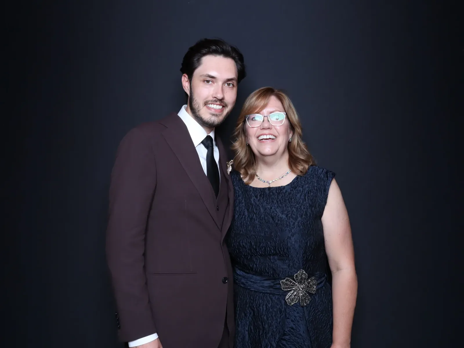 Groom and his mother in the Luxe enclosed photo booth