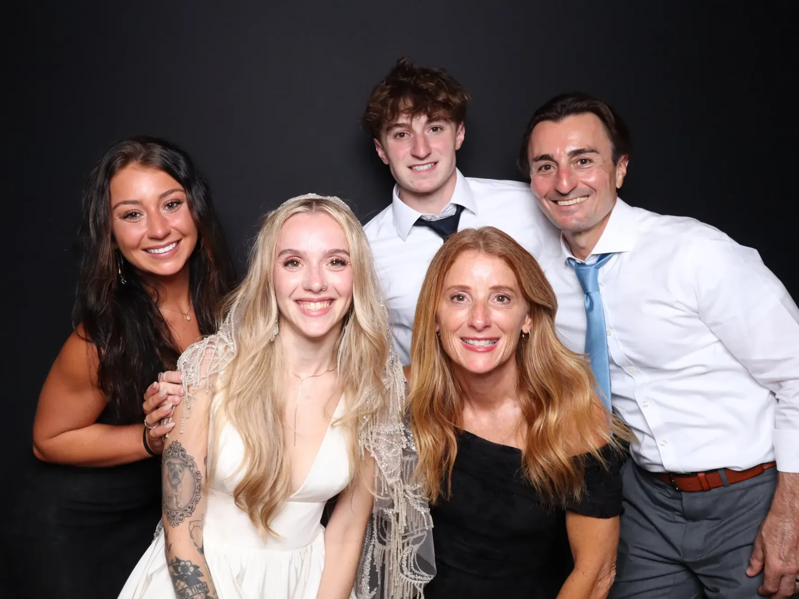 Wedding friends in the Luxe enclosed photo booth in Chicago