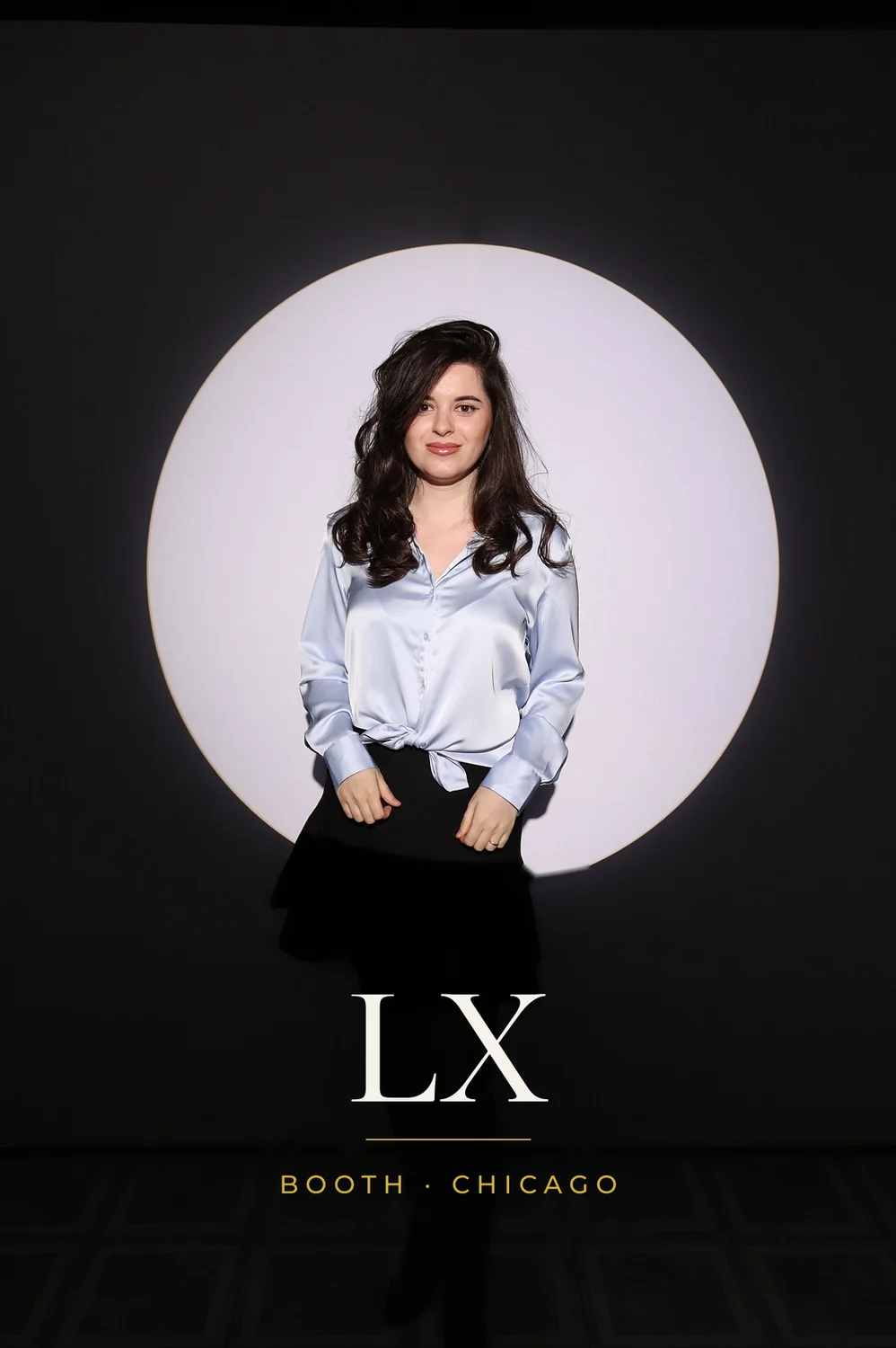 Guest portrait inside the circle of light, printed as a 4x6 Spotlight photo booth print