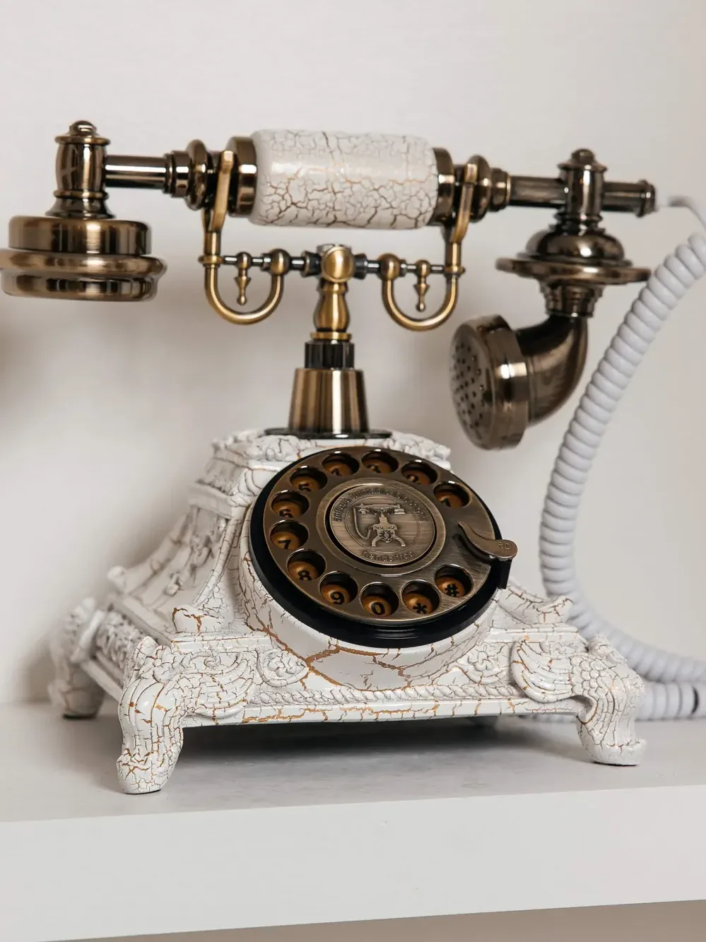 Vintage ivory rotary phone used as an audio guestbook