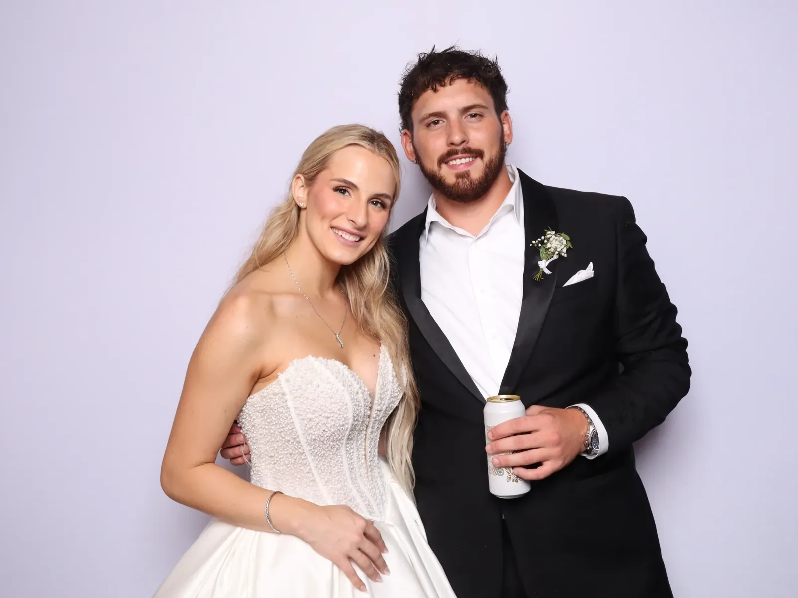 Bride and groom in a color wedding photo booth in Chicago