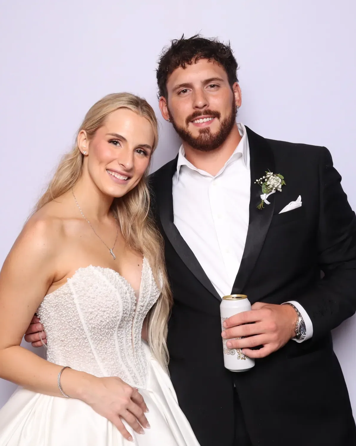 Bride and groom in a color wedding photo booth in Chicago